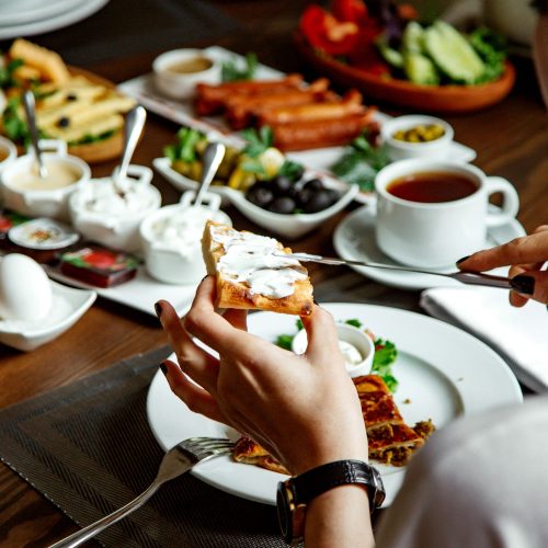 breakfast set with various food on the table